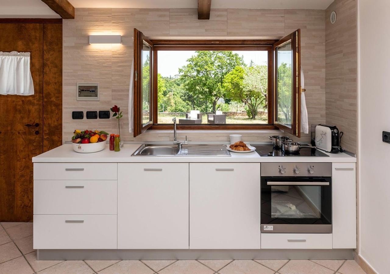 I Trulli Di Eva Apartment โนซิ ภายนอก รูปภาพ