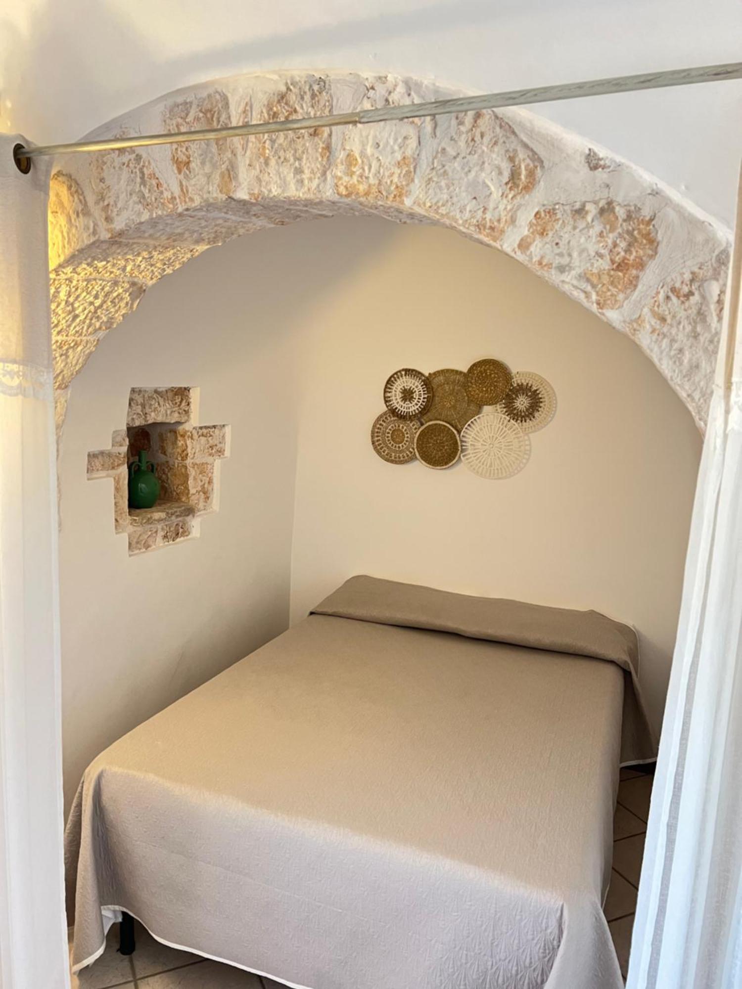 I Trulli Di Eva Apartment โนซิ ภายนอก รูปภาพ