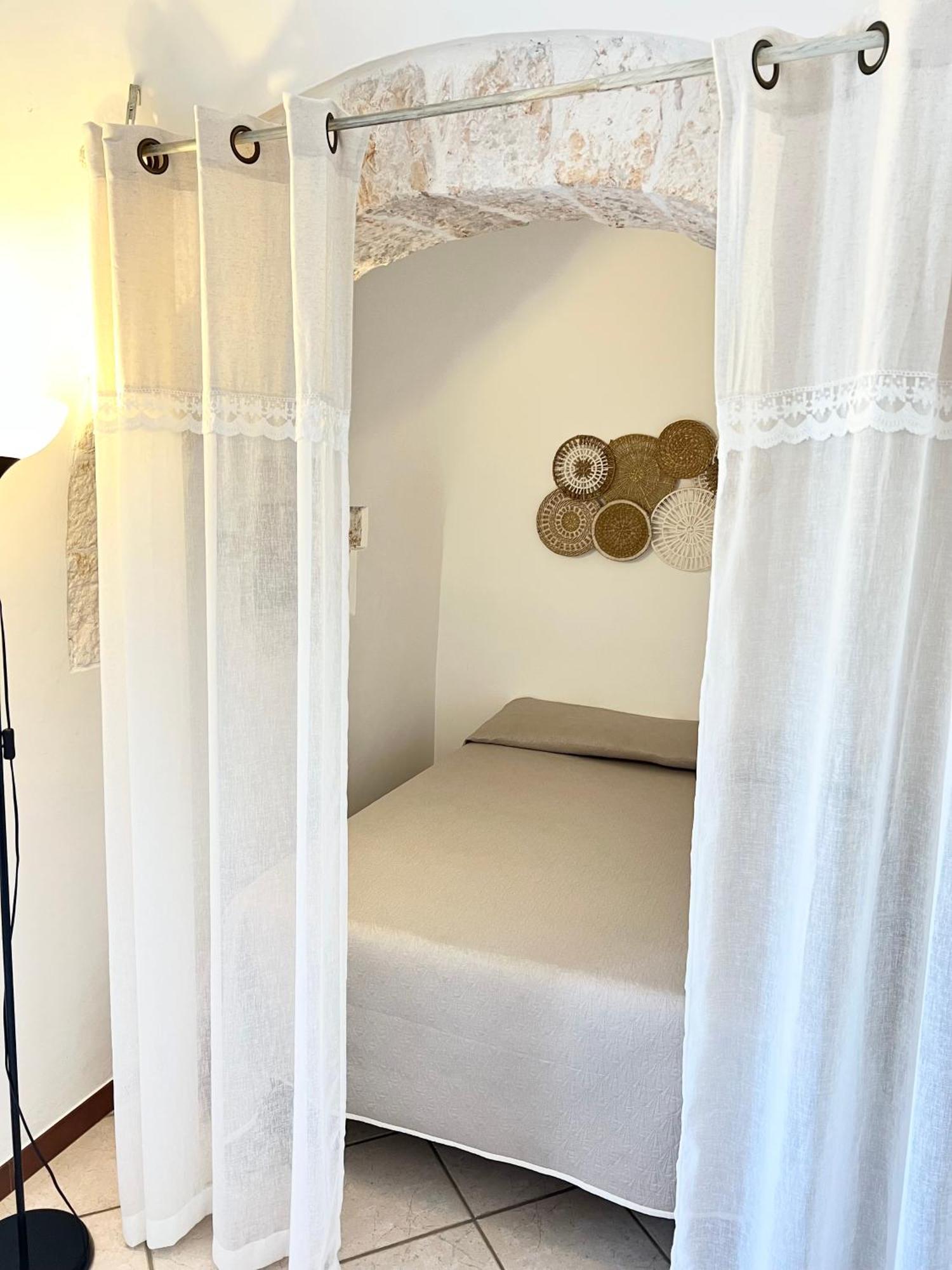 I Trulli Di Eva Apartment โนซิ ภายนอก รูปภาพ