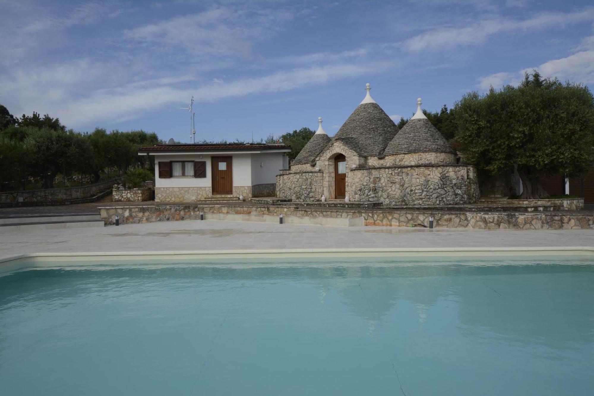 I Trulli Di Eva Apartment โนซิ ภายนอก รูปภาพ