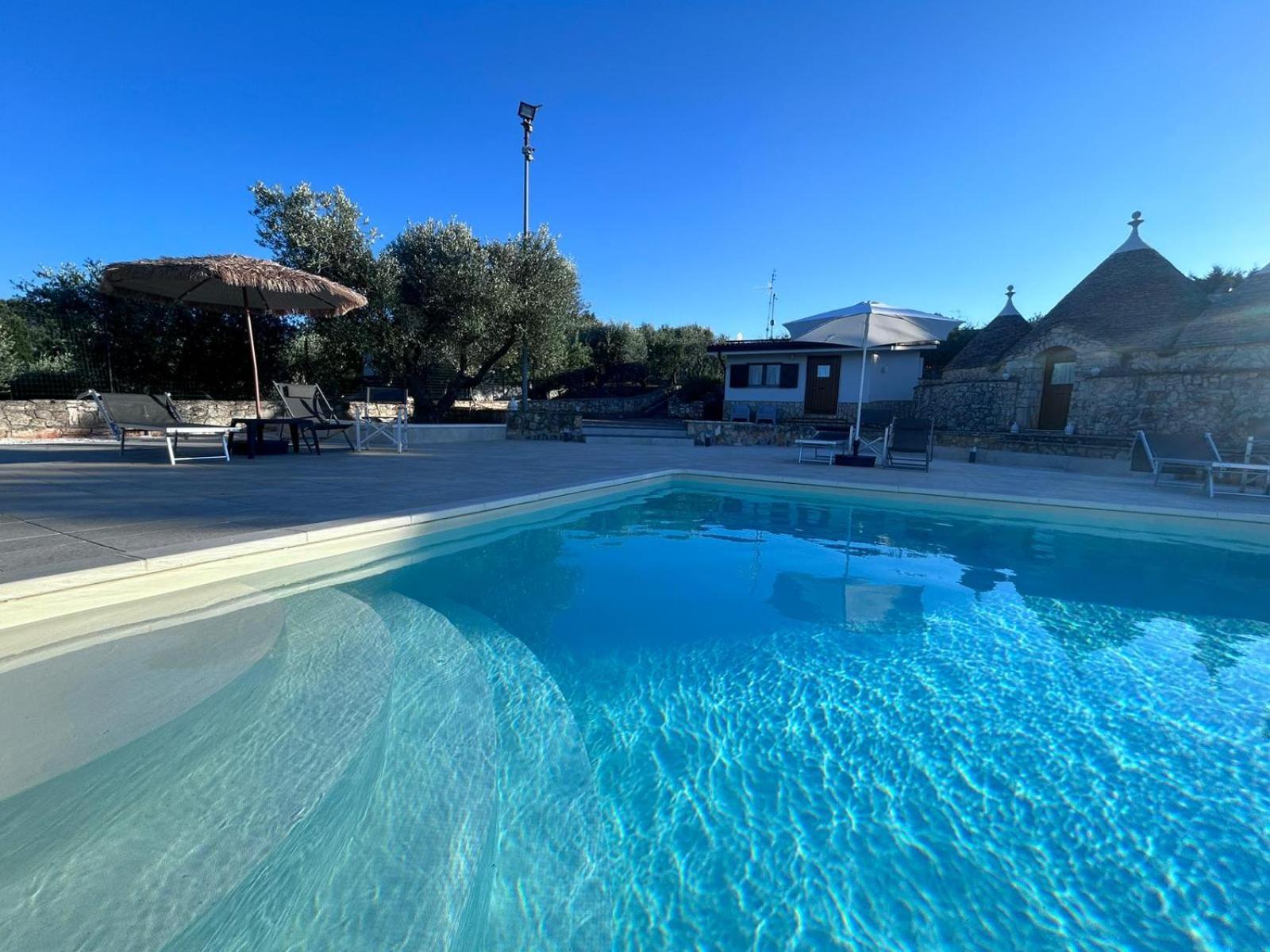 I Trulli Di Eva Apartment โนซิ ภายนอก รูปภาพ