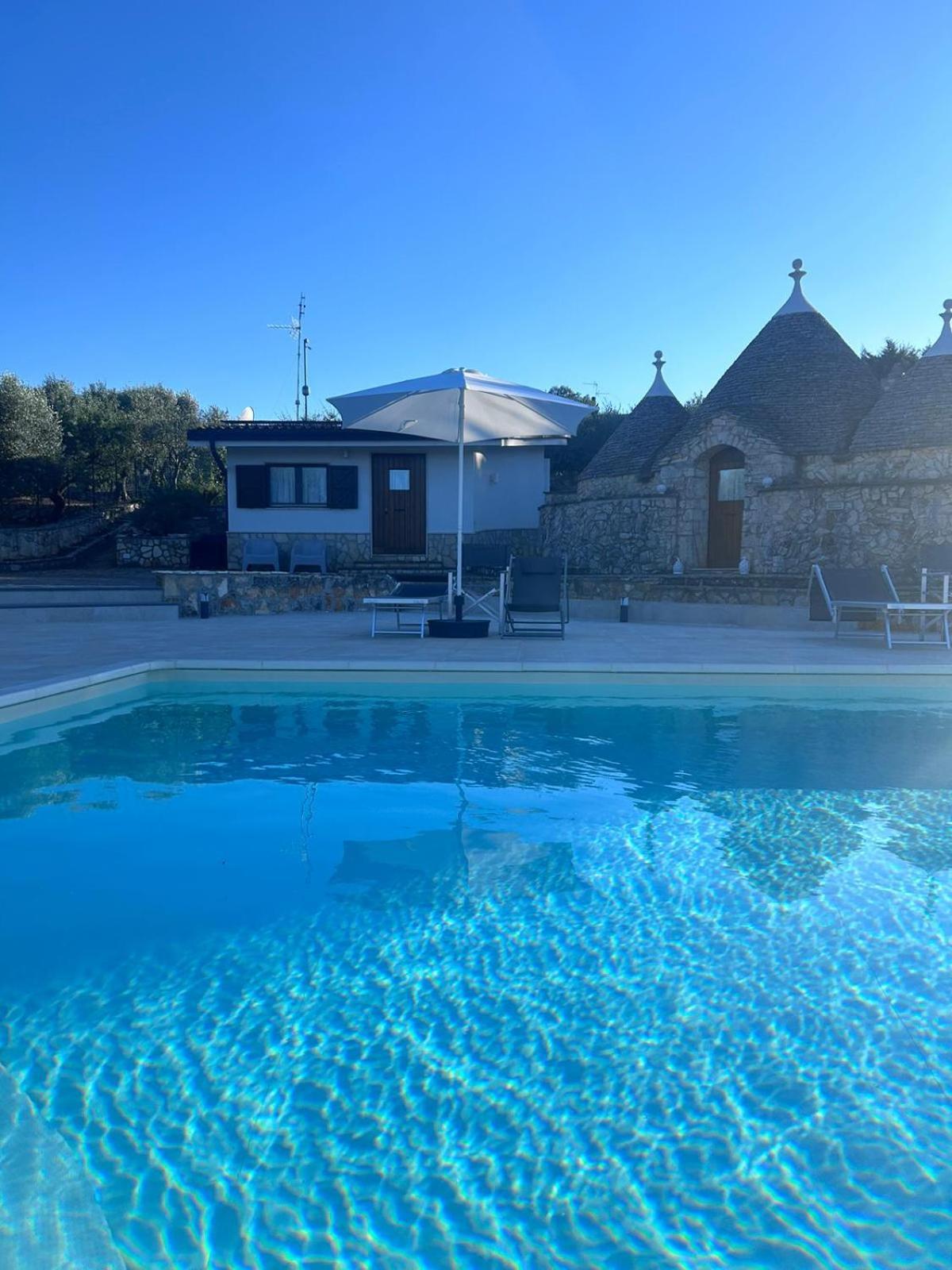 I Trulli Di Eva Apartment โนซิ ภายนอก รูปภาพ